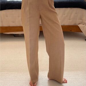 Aritzia's The Effortless Pant pleated trouser in gorgeous light thatched camel